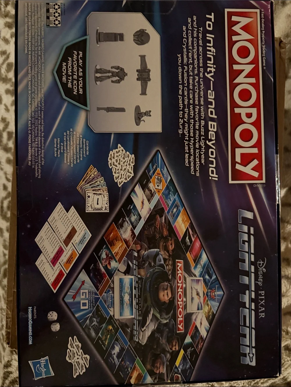 Hasbro Monopoly Lightyear Board Game with Red and Green Artwork